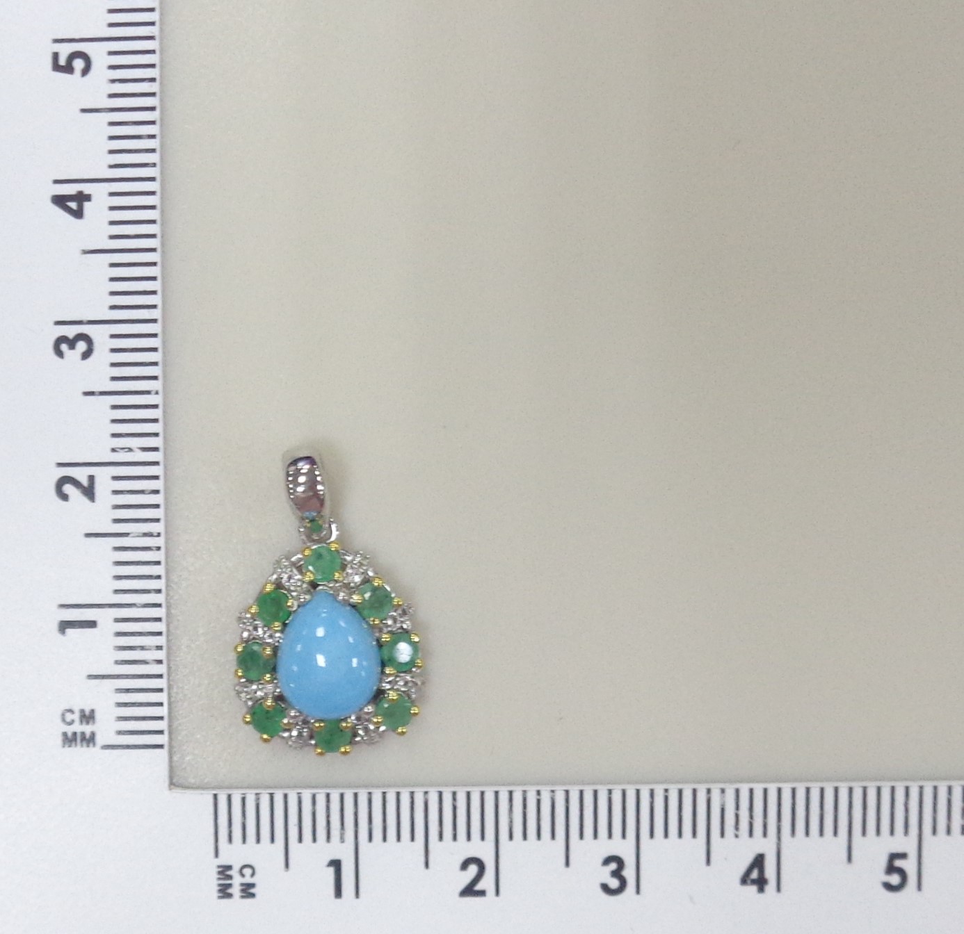 Серебряная подвеска с бирюзой и изумрудами